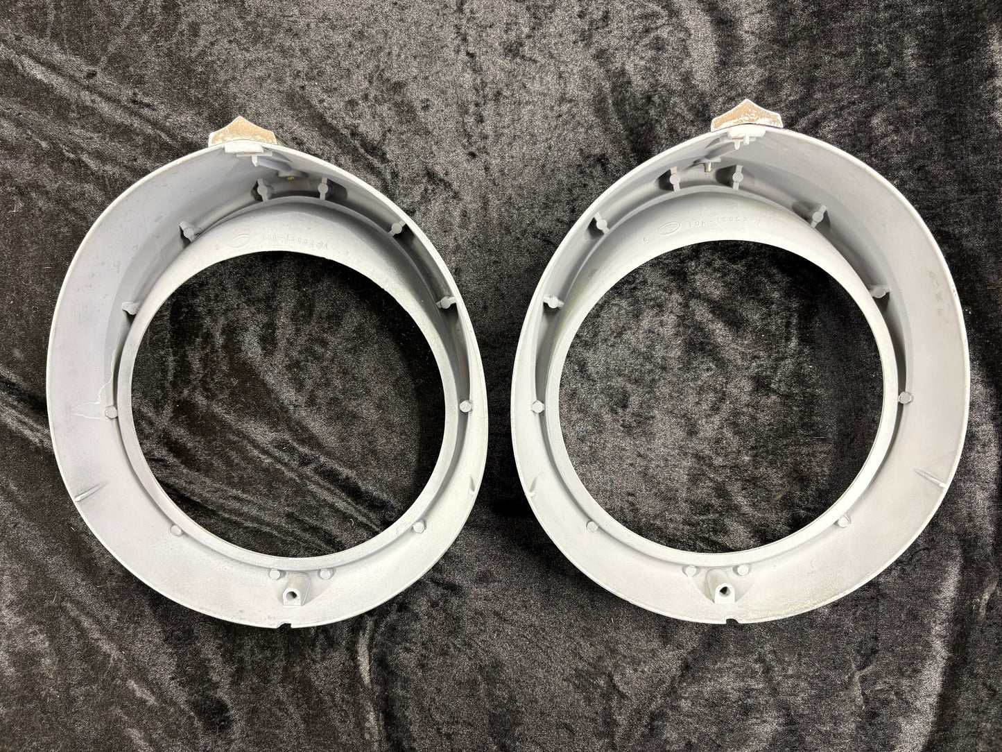 1956 Ford headlight doors (often called bezels) with part number  FDR-13052-A