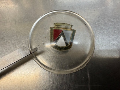 56/57 FORD HORN RING CENTER EMBLEM/MEDALLION