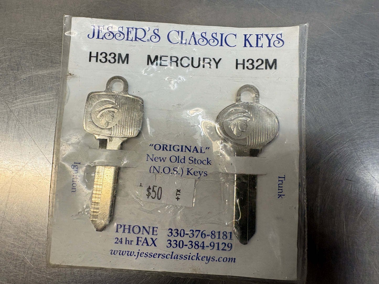 Mercury Man ignition and trunk key blanks