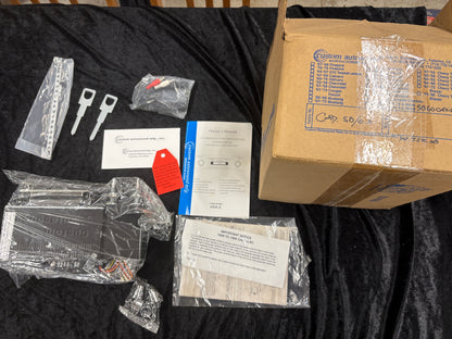Custom Autosound USA-230 radio (part number CAM-CAD-58/0-230) for a 1958–1960 Cadillac