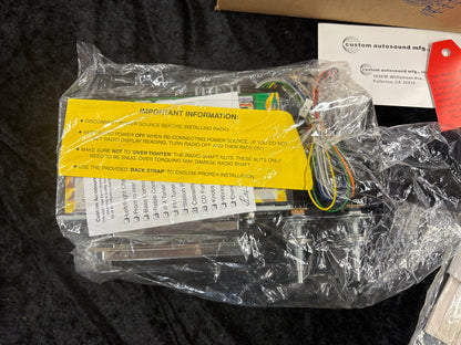 Custom Autosound USA-230 radio (part number CAM-CAD-58/0-230) for a 1958–1960 Cadillac